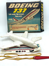 Load image into Gallery viewer, Detailed view of Mettoy airplane model showcasing its design.
