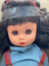 Carica l'immagine nel visualizzatore di Gallery, Close-up detail of Italocremona doll's face showing curly hair and blue eyes.
