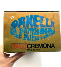 Carica l'immagine nel visualizzatore di Gallery, Italocremona doll packaging front view with illustration and brand logo in orange and blue.
