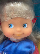 Carica l'immagine nel visualizzatore di Gallery, Close-up of Furga Doll's face featuring big blue eyes and gray hair.
