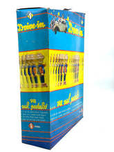 Carica l'immagine nel visualizzatore di Gallery, Side view of a colorful game box displaying the game title and illustrations.
