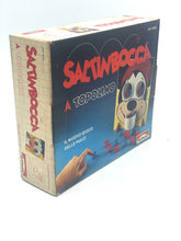 Load image into Gallery viewer, Del Ponte board game box from an angled side view displaying cartoon dog and game title.
