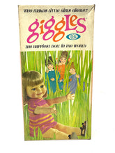 Load image into Gallery viewer, Ideal Toy Giggles doll packaging front view with colorful graphics and illustrations.
