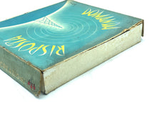 Load image into Gallery viewer, Detail of the textured cover of the vintage board game with gold lettering.

