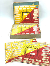 Load image into Gallery viewer, Lifestyle shot of the open board game displaying game pieces and instruction layout.
