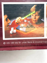 Load image into Gallery viewer, MB Board Game Sixth Sense 3D Electronic close-up of the side with colorful design and game title.
