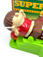 Load image into Gallery viewer, Close-up of Bandai Vintage Super Gnam toy figure with a smiling face and short hair.
