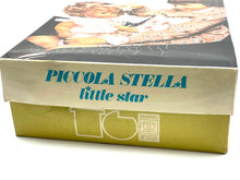 Load image into Gallery viewer, Sebino doll packaging top view displaying the brand name.
