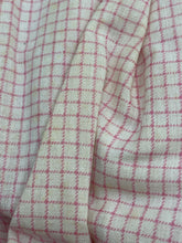 Load image into Gallery viewer, Detail view of the fabric pattern showing a red and white checkered design.
