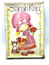 Load image into Gallery viewer, Front view of the illustrated packaging featuring a girl with a flower basket.
