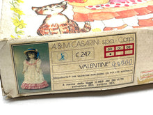 Load image into Gallery viewer, Detail view of the vintage doll box with illustrated design and label.
