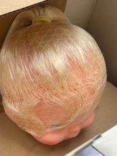 Carica l'immagine nel visualizzatore di Gallery, Close-up of Mattel Baby Kickie Doll head showcasing hair detail inside the box.

