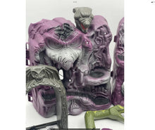 Load image into Gallery viewer, Mattel Masters of the Universe Snake Mountain action figure close-up showcasing detailed features.
