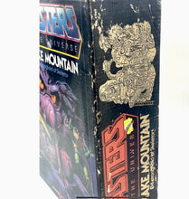 Load image into Gallery viewer, Mattel Masters of the Universe Snake Mountain packaging side view with graphic design details.
