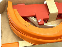 Load image into Gallery viewer, Mattel Hot Wheels Rod Runner Speedway Set detail close-up showing game components in orange and red.
