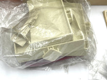 Load image into Gallery viewer, Detail showing packaging contents with various parts wrapped in plastic.
