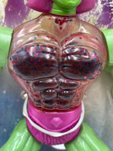 Carica l'immagine nel visualizzatore di Gallery, Detail view of the Speclatron Venum action figure torso featuring a transparent chest and pink belt.
