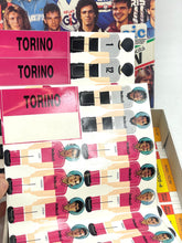 Load image into Gallery viewer, Close-up of player cards featuring images and text overlay in pink, black, and white.
