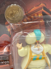 Load image into Gallery viewer, Close-up of Aladdin Iago Lago parrot figure with gold coin and transparent packaging.
