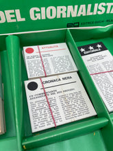 Load image into Gallery viewer, 1967 scoop! board game cards arranged in a green tray with visible text on cards.
