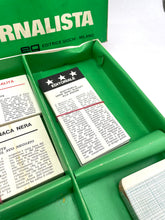 Load image into Gallery viewer, 1967 scoop! board game cards in a green tray displaying text on cards.
