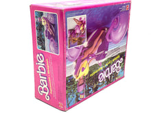 Carica l'immagine nel visualizzatore di Gallery, Angled view of the Mattel Barbie doll box featuring colorful design in pink and purple.
