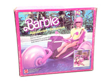 Carica l'immagine nel visualizzatore di Gallery, Mattel Barbie Aquamobil Bicisplash packaging showing pool theme accessories in pink and purple.
