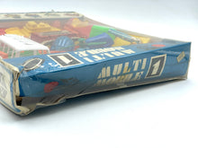 Load image into Gallery viewer, Side view of Tomy Jouets Mont Blanc Multi mobile box showing worn edges and colorful design.
