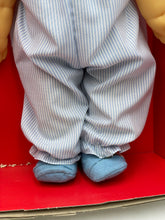 Load image into Gallery viewer, Close-up detail of Gabar Doll 80's Cirilla's feet in denim overalls and small shoes.
