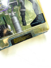 Load image into Gallery viewer, Detail view of accessories for McFarlane Toys Spawn The Movie Jessica Priest including weapons.
