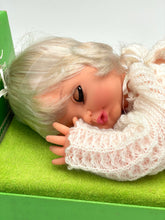 Load image into Gallery viewer, Sebino Nella doll's face close-up showing a sleeping expression and blonde hair.
