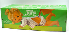 Load image into Gallery viewer, Sebino Nella doll packaging front view featuring a colorful design with a cartoon lion.

