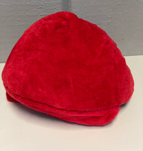 Load image into Gallery viewer, Side view of a red hat made of soft fabric with a rounded shape.
