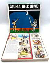 Load image into Gallery viewer, Lifestyle shot of Anni 60 La storia dell'uomo board game box with game pieces and instruction booklet.
