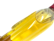 Load image into Gallery viewer, Front view of yellow liquid bottle for Paperino's Shampoo featuring curved shape and label design.
