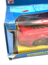 Carica l'immagine nel visualizzatore di Gallery, Close-up view of the red toy car highlighting packaging damage.
