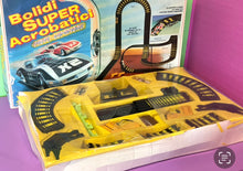 Load image into Gallery viewer, Tyco packaging front view displaying colorful graphics and track layout.
