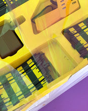 Load image into Gallery viewer, Tyco Daredevil Super Cliff Turbovettes Set yellow packaging detail with graphic design and transparent window.
