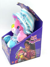 Load image into Gallery viewer, Front view of colorful plush toy with a striped hat and box packaging.
