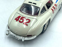 Load image into Gallery viewer, Burago Mercedes 300SL rear view displaying tail lights and curved design.
