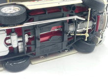 Load image into Gallery viewer, Burago Mercedes 300SL undercarriage detail revealing suspension and exposed chassis.
