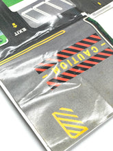 Load image into Gallery viewer, Galoob Micro Machines Truck 'N Service Centre close-up showing warning signs and road markings.
