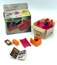 Load image into Gallery viewer, Globo Italy Micro Transformers Argon Autobot lifestyle shot featuring various game components.
