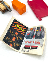 Load image into Gallery viewer, Globo Italy Micro Transformers Argon Autobot magazine open view displaying colorful graphics.
