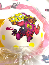 Carica l'immagine nel visualizzatore di Gallery, Close-up detail of the colorful candy bag highlighting the cartoon character and design.
