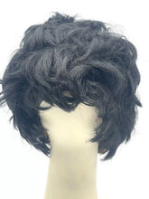 Carica l'immagine nel visualizzatore di Gallery, Front view of a curly black wig with medium length on a white background.
