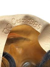 Carica l'immagine nel visualizzatore di Gallery, Detail view of the interior of a wig cap showing label and elastic band.
