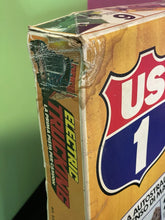 Load image into Gallery viewer, Side view of sealed Tyco US1 Electric Trucking set packaging


