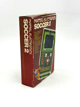 Load image into Gallery viewer, Back of Mattel Soccer 1979 handheld showing label and condition
