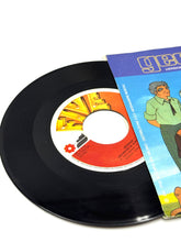 Load image into Gallery viewer, Vinyl record of Cristina D’Avena Georgie theme song 45 RPM single
